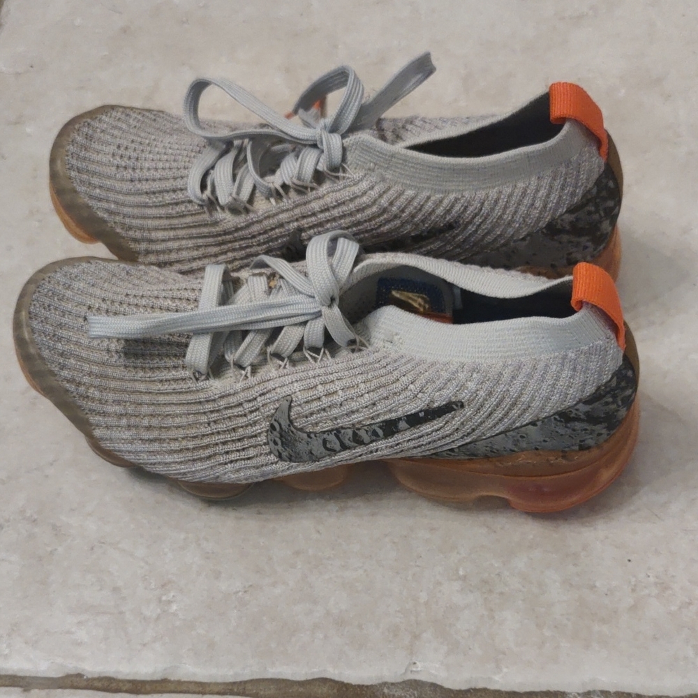 Nike Knit Sneakers with Orange Highlights